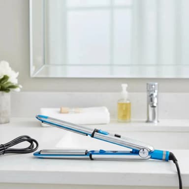 Plancha de cabello Frigga FA-1077 plateada y azul